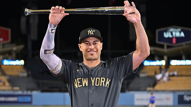 Jul 19, 2022; Los Angeles, California, USA; American League outfielder Giancarlo Stanton (27) of the New York Yankees celebrates after being named Ted Williams most valuable player of the 2022 All Star game at Dodger Stadium. Mandatory Credit: Jayne Kamin-Oncea-USA TODAY Sports