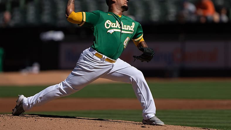 Jul 21, 2022; Oakland, California, USA; Oakland Athletics starting pitcher Frankie Montas (47) pitches during the first inning against the Detroit Tigers at RingCentral Coliseum. Mandatory Credit: Stan Szeto-USA TODAY Sports