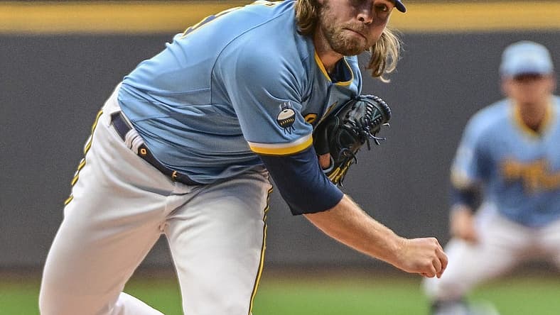Jul 22, 2022; Milwaukee, Wisconsin, USA; Milwaukee Brewers pitcher Corbin Burnes (39) throws a pitch in the first inning against the Colorado Rockies at American Family Field. Mandatory Credit: Benny Sieu-USA TODAY Sports