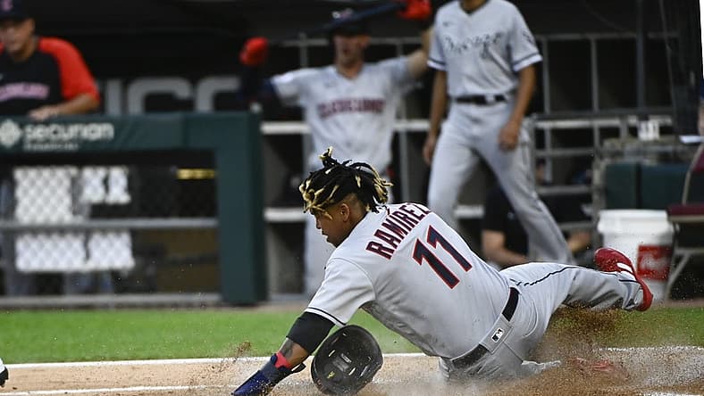 Jul 22, 2022; Chicago, Illinois, USA; Cleveland Guardians third baseman Jose Ramirez (11) scores against the Chicago White Sox during the first inning at Guaranteed Rate Field. Mandatory Credit: Matt Marton-USA TODAY Sports