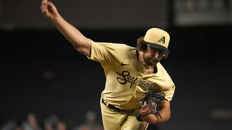 Jul 22, 2022; Phoenix, Arizona, USA; Arizona Diamondbacks starting pitcher Zac Gallen (23) pitches against the Washington Nationals during the sixth inning at Chase Field. Mandatory Credit: Joe Camporeale-USA TODAY Sports