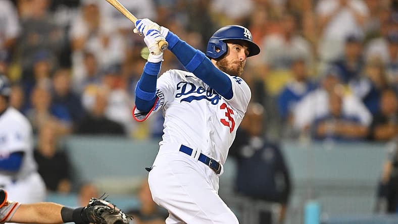 Jul 22, 2022; Los Angeles, California, USA; Los Angeles Dodgers center fielder Cody Bellinger (35) hits a grand slam home run in the eighth inning against the San Francisco Giants at Dodger Stadium. Mandatory Credit: Jayne Kamin-Oncea-USA TODAY Sports