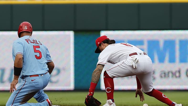 Jul 23, 2022; Cincinnati, Ohio, USA; St. Louis Cardinals designated hitter Albert Pujols (5) safely reaches second against Cincinnati Reds second baseman Jonathan India (6) during the second inning at Great American Ball Park. Mandatory Credit: David Kohl-USA TODAY Sports