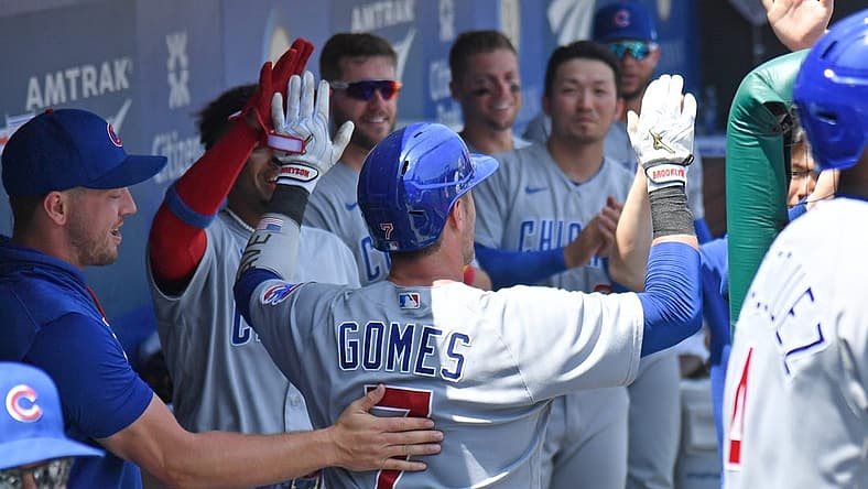 Jul 24, 2022; Philadelphia, Pennsylvania, USA; Chicago Cubs catcher Yan Gomes (7) celebrates his home run in the dugout against the Philadelphia Phillies during the fourth inning at Citizens Bank Park. Mandatory Credit: Eric Hartline-USA TODAY Sports
