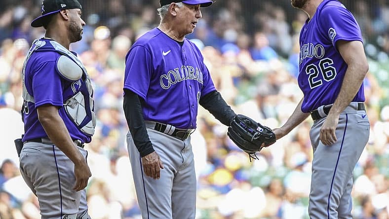 Jul 24, 2022; Milwaukee, Wisconsin, USA; Colorado Rockies manager Bud Black talks to pitcher Austin Gomber (26) during a pitching change in the third inning against the Milwaukee Brewers at American Family Field. Mandatory Credit: Benny Sieu-USA TODAY Sports