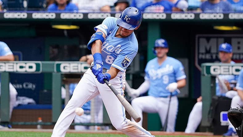 Jul 24, 2022; Kansas City, Missouri, USA; Kansas City Royals second baseman Nicky Lopez (8) hits a single against the Tampa Bay Rays in the seventh inning at Kauffman Stadium. Mandatory Credit: Denny Medley-USA TODAY Sports