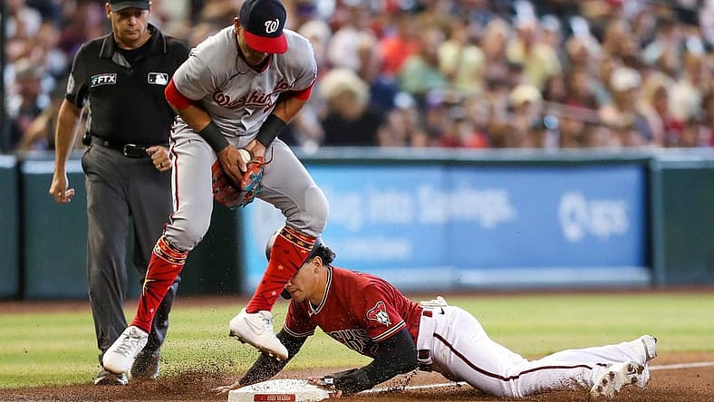 Arizona Diamondbacks center fielder Alek Thomas (5), right, makes it safe to third base as Washington Nationals third baseman Ehire Adrianza (5), left, catched the ball against the Washington Nationals at Chase Field on Sunday, July 24, 20222, in Phoenix.
Uscp 7m0c0fzkfyx1lw83r1rk2 Original