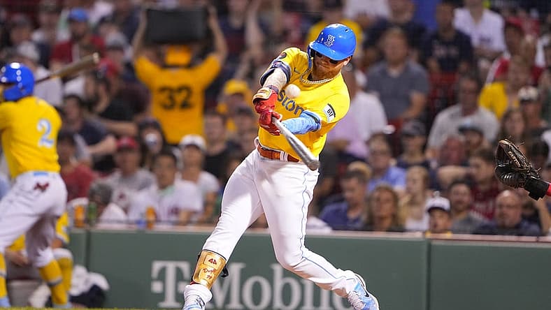 Jul 25, 2022; Boston, Massachusetts, USA; Boston Red Sox left fielder Alex Verdugo (99) hits an RBI double against the Cleveland Guardians during the sixth inning at Fenway Park. Mandatory Credit: Gregory Fisher-USA TODAY Sports