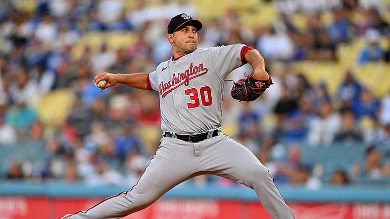 Jul 25, 2022; Los Angeles, California, USA; Washington Nationals starting pitcher Paolo Espino (30) throws a pitch in the first inning against the Los Angeles Dodgers at Dodger Stadium. Mandatory Credit: Jayne Kamin-Oncea-USA TODAY Sports