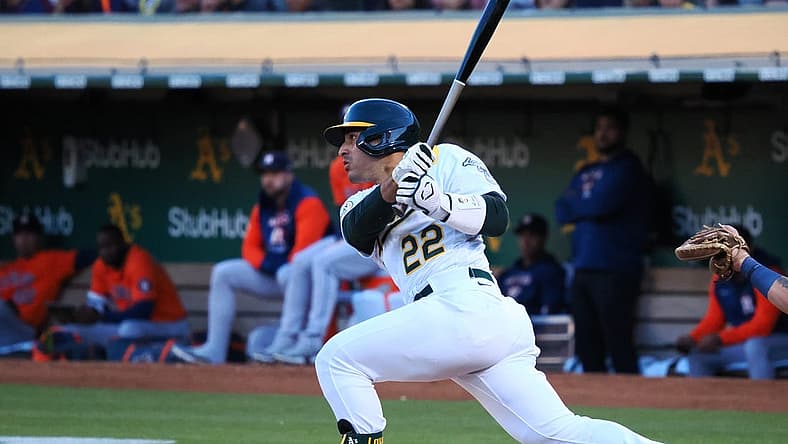 Jul 25, 2022; Oakland, California, USA; Oakland Athletics right fielder Ramon Laureano (22) hits a double against the Houston Astros during the fourth inning at RingCentral Coliseum. Mandatory Credit: Kelley L Cox-USA TODAY Sports