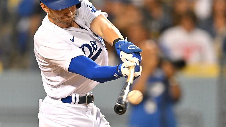 Jul 25, 2022; Los Angeles, California, USA; Los Angeles Dodgers shortstop Trea Turner (6) doubles in the fourth inning against the Washington Nationals at Dodger Stadium. Mandatory Credit: Jayne Kamin-Oncea-USA TODAY Sports