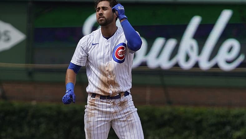 Jul 26, 2022; Chicago, Illinois, USA; Chicago Cubs first baseman Alfonso Rivas (36) gestures after a double during the fourth inning against the Pittsburgh Pirates at Wrigley Field. Mandatory Credit: David Banks-USA TODAY Sports
