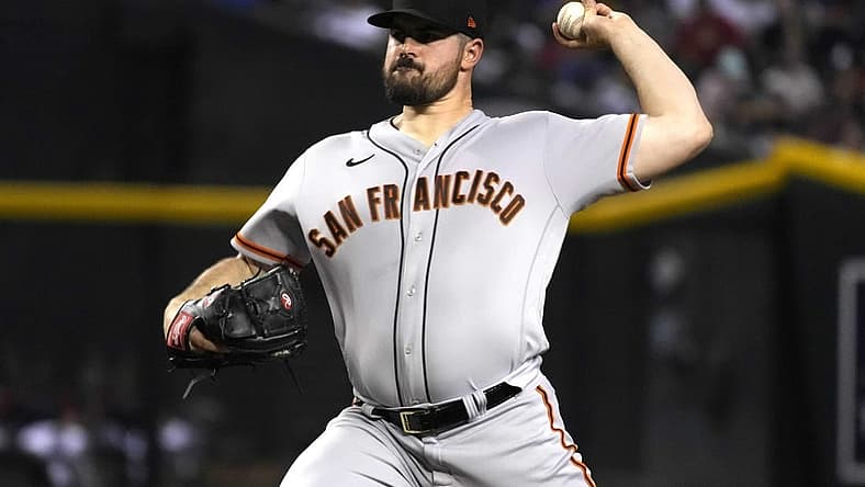 Jul 26, 2022; Phoenix, Arizona, USA; San Francisco Giants starting pitcher Carlos Rodon (16) throws against the Arizona Diamondbacks in the first inning at Chase Field. Mandatory Credit: Rick Scuteri-USA TODAY Sports