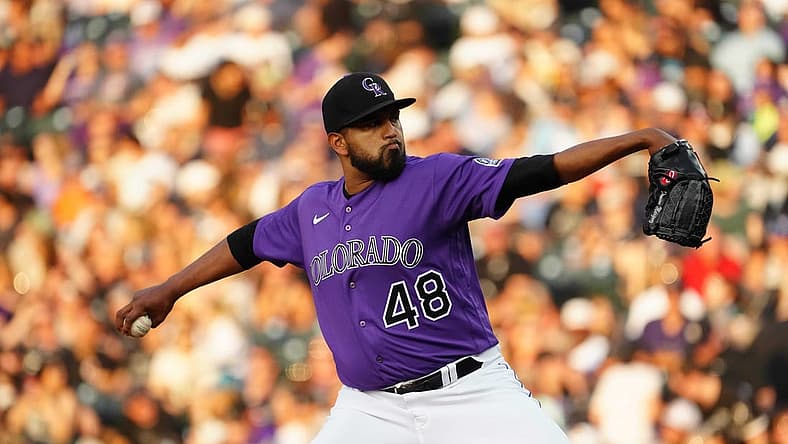 Jul 26, 2022; Denver, Colorado, USA;  Colorado Rockies starting pitcher German Marquez (48) delivers a pitch in the third inning against the Chicago White Sox at Coors Field. Mandatory Credit: Ron Chenoy-USA TODAY Sports