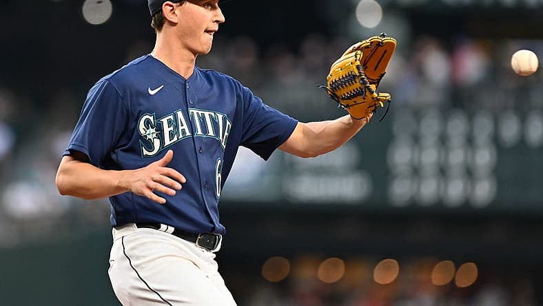Jul 26, 2022; Seattle, Washington, USA; Seattle Mariners starting pitcher George Kirby (68) catches a throw by first baseman Ty France (23) (not pictured) for the out on Texas Rangers center fielder Leody Taveras (3) (not pictured) at first base during the fifth inning at T-Mobile Park. Mandatory Credit: Steven Bisig-USA TODAY Sports