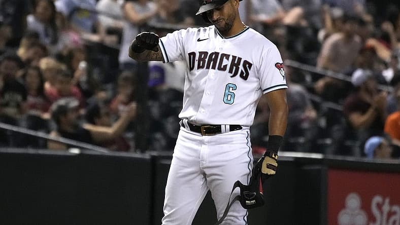 Jul 26, 2022; Phoenix, Arizona, USA; Arizona Diamondbacks left fielder David Peralta (6) reacts after hitting an RBI triple against the San Francisco Giants in the eighth inning at Chase Field. Mandatory Credit: Rick Scuteri-USA TODAY Sports