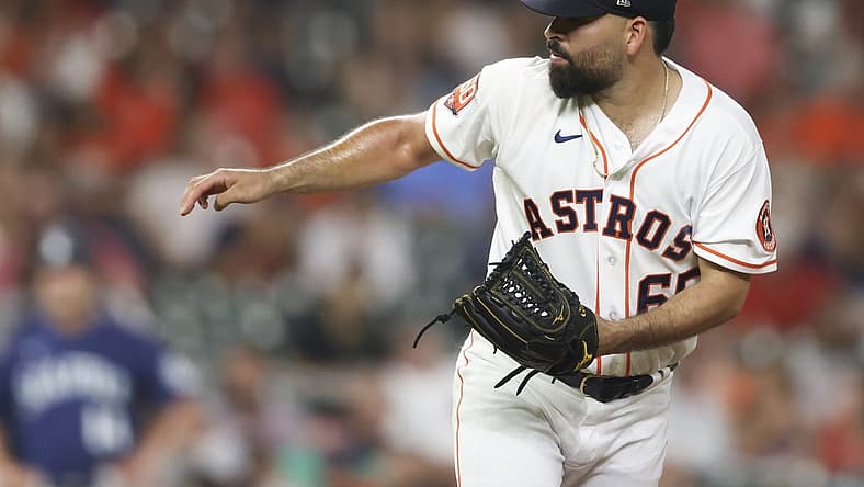 Jul 28, 2022; Houston, Texas, USA; Houston Astros starting pitcher Jose Urquidy (65) pitches against the Seattle Mariners in fifth inning at Minute Maid Park. Mandatory Credit: Thomas Shea-USA TODAY Sports