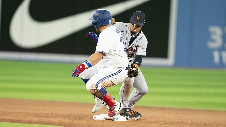 Jul 28, 2022; Toronto, Ontario, CAN; Toronto Blue Jays designated hitter Alejandro Kirk (30) slides into second base safe ahead of the tag from Detroit Tigers shortstop Javier Baez (28) during the seventh inning at Rogers Centre. Mandatory Credit: Nick Turchiaro-USA TODAY Sports