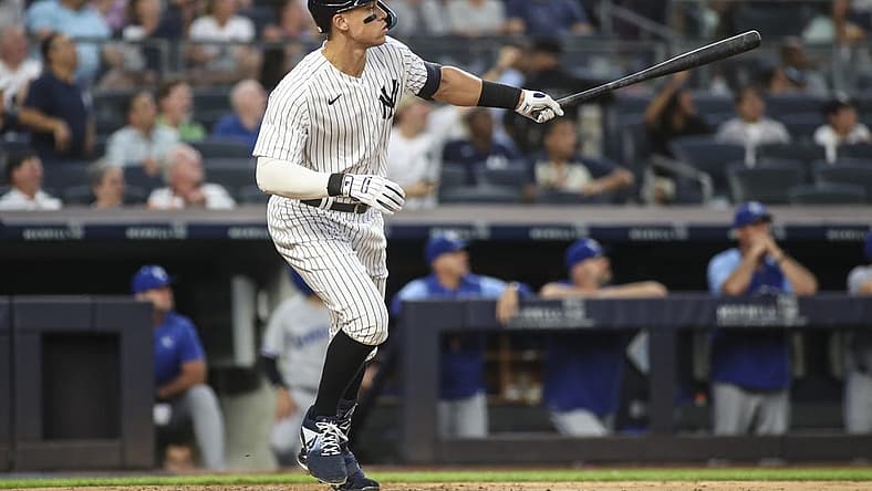 Jul 29, 2022; Bronx, New York, USA; New York Yankees right fielder Aaron Judge (99) hits a two run home run in the third inning against the Kansas City Royals at Yankee Stadium. Mandatory Credit: Wendell Cruz-USA TODAY Sports