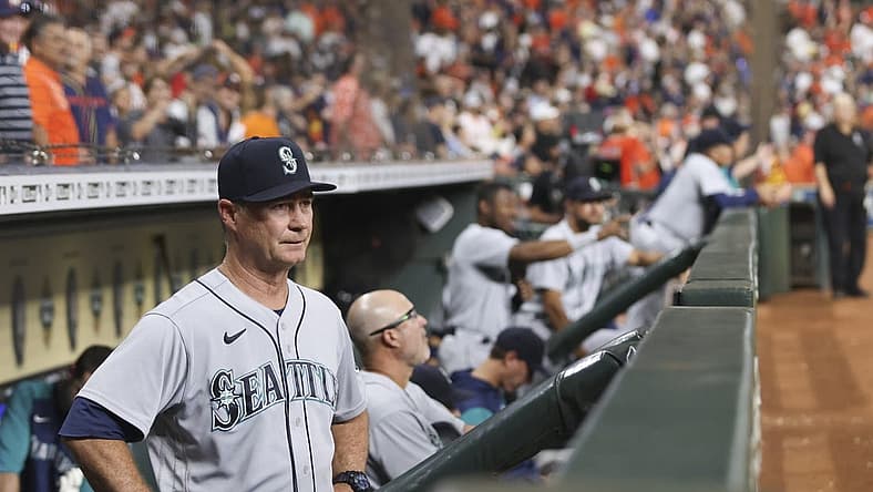 Jul 29, 2022; Houston, Texas, USA; Seattle Mariners manager Scott Servais (9) watches play against the Houston Astros in the seventh inning at Minute Maid Park. Mandatory Credit: Thomas Shea-USA TODAY Sports