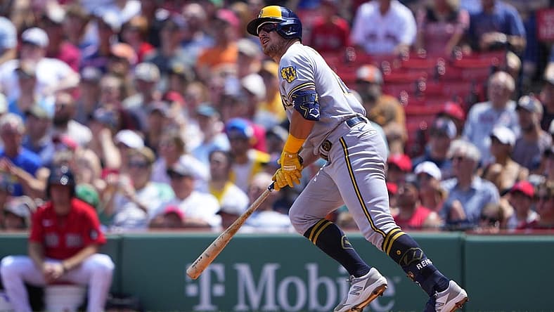 Jul 31, 2022; Boston, Massachusetts, USA; Milwaukee Brewers right fielder Hunter Renfroe (12) watches his two-run home run against the Boston Red Sox during the second inning at Fenway Park. Mandatory Credit: Gregory Fisher-USA TODAY Sports