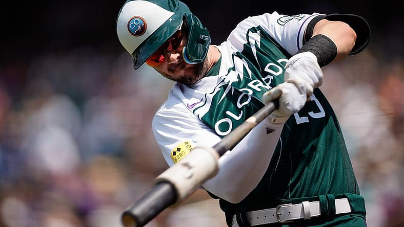 Jul 31, 2022; Denver, Colorado, USA; Colorado Rockies left fielder Kris Bryant (23) warms up on deck in the first inning against the Los Angeles Dodgers at Coors Field. Mandatory Credit: Isaiah J. Downing-USA TODAY Sports