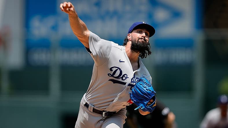 Jul 31, 2022; Denver, Colorado, USA; Los Angeles Dodgers starting pitcher Tony Gonsolin (26) pitches in the first inning against the Colorado Rockies at Coors Field. Mandatory Credit: Isaiah J. Downing-USA TODAY Sports
