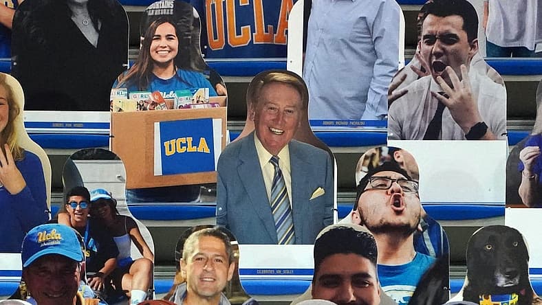 Dec 11, 2020; Los Angeles, California, USA; A fan cutout of Los Angeles Dodgers former broadcaster Vin Scully in the stands during the NCAA basketball game between the UCLA Bruins and the Marquette Golden Eagles at Pauley Pavilion. UCLA defeated Marquette 69-60. Mandatory Credit: Kirby Lee-USA TODAY Sports
