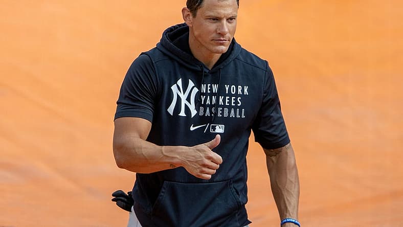 Mar 20, 2021; Sarasota, Florida, USA; New York Yankees first baseman Derek Dietrich (12) walks off the field after batting practice during spring training at Ed Smith Stadium. Mandatory Credit: Nathan Ray Seebeck-USA TODAY Sports