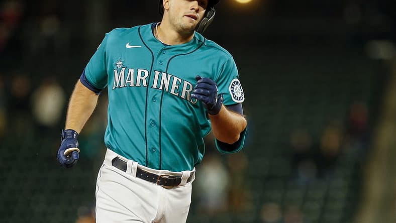 Apr 16, 2021; Seattle, Washington, USA; Seattle Mariners first baseman Evan White runs the bases after hitting a solo-home run against the Houston Astros during the eighth inning at T-Mobile Park. Mandatory Credit: Joe Nicholson-USA TODAY Sports
