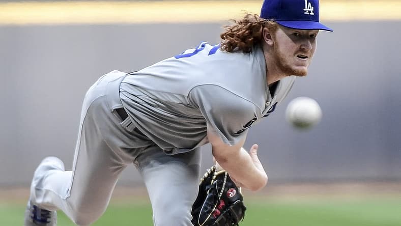 May 1, 2021; Milwaukee, Wisconsin, USA; Los Angeles Dodgers pitcher Dustin May (85) pitches in the first inning against the Milwaukee Brewers at American Family Field. Mandatory Credit: Benny Sieu-USA TODAY Sports