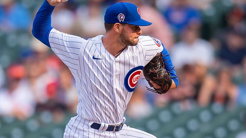 Sep 11, 2021; Chicago, Illinois, USA; Chicago Cubs relief pitcher Scott Effross (57) pitches during a game against the San Francisco Giants at Wrigley Field. Mandatory Credit: Patrick Gorski-USA TODAY Sports