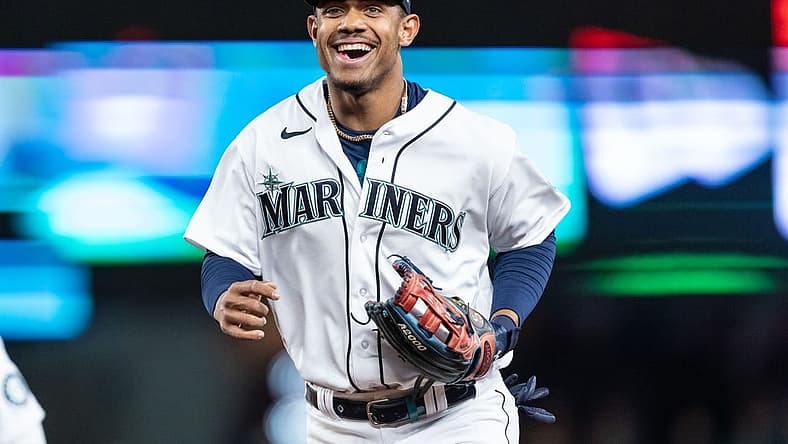 May 5, 2022; Seattle, Washington, USA; Seattle Mariners centerfielder Julio Rodriguez (44) smiles while jogging of the field during a game against the Tampa Bay Rays at T-Mobile Park. Mandatory Credit: Stephen Brashear-USA TODAY Sports