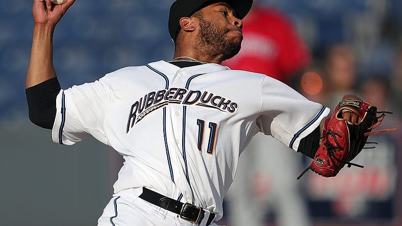 Akron RubberDucks pitcher Xzavion Curry (11) throws against the Erie SeaWolves during the first inning of an MiLB baseball game at Canal Park on Tuesday.

Ducks 1
