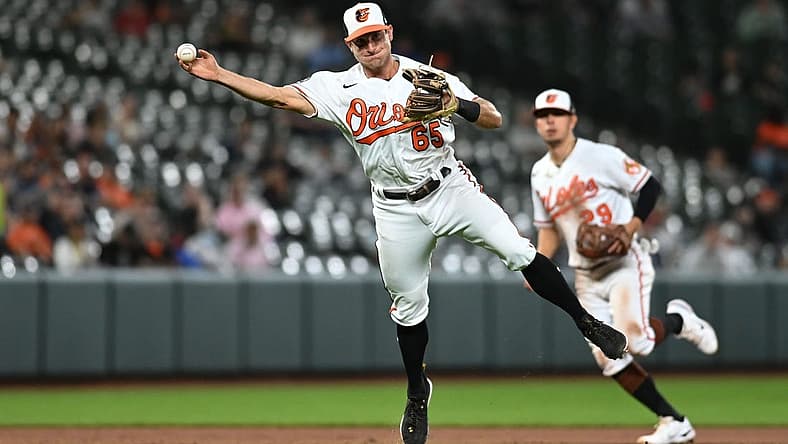 May 16, 2022; Baltimore, Maryland, USA; Baltimore Orioles third baseman Rylan Bannon (65) throws to first base during the game against the New York Yankees  at Oriole Park at Camden Yards. Mandatory Credit: Tommy Gilligan-USA TODAY Sports