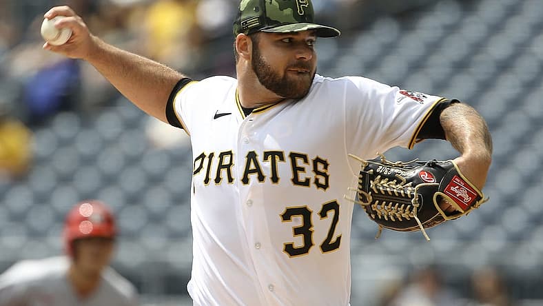 May 22, 2022; Pittsburgh, Pennsylvania, USA; Pittsburgh Pirates starting pitcher Bryse Wilson (32) delivers a pitch against the St. Louis Cardinals during the first inning at PNC Park. Mandatory Credit: Charles LeClaire-USA TODAY Sports