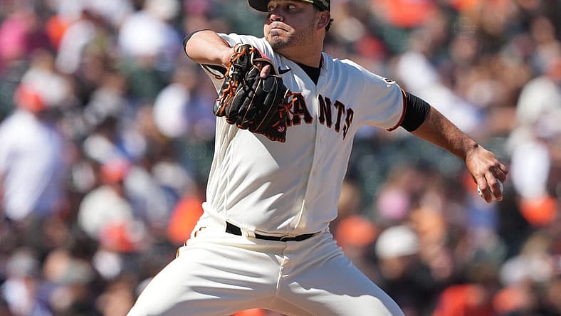 May 21, 2022; San Francisco, California, USA; San Francisco Giants relief pitcher Jose Alvarez (48) throws a pitch against the San Diego Padres during the ninth inning at Oracle Park. Mandatory Credit: Darren Yamashita-USA TODAY Sports