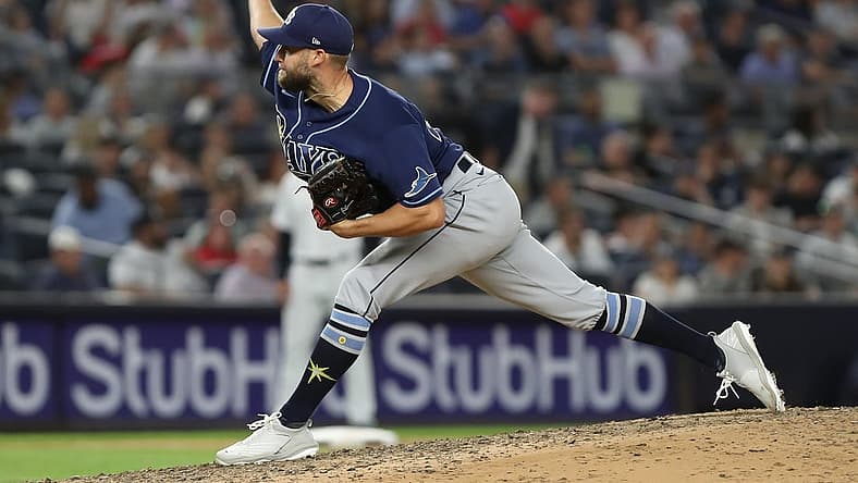 Jun 14, 2022; Bronx, New York, USA; Tampa Bay Rays relief pitcher Luke Bard (46) pitches the ball against the New York Yankees during the seventh inning at Yankee Stadium. Mandatory Credit: Tom Horak-USA TODAY Sports