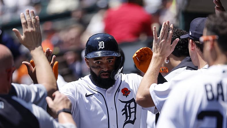 May 30, 2022; Detroit, Michigan, USA; Detroit Tigers center fielder Derek Hill (54) receives congratulations from teammates after he hits a home run in the third inning against the Minnesota Twins at Comerica Park. Mandatory Credit: Rick Osentoski-USA TODAY Sports