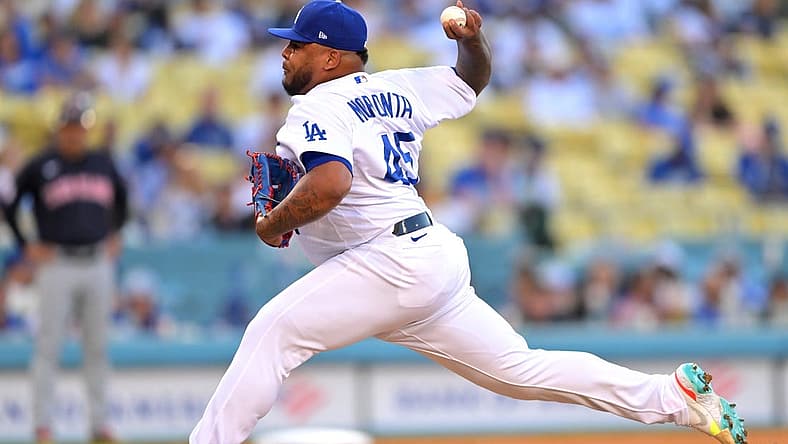 Jun 18, 2022; Los Angeles, California, USA;  Los Angeles Dodgers relief pitcher Reyes Moronta (45) throws a scoreless ninth against the Cleveland Guardians at Dodger Stadium. Mandatory Credit: Jayne Kamin-Oncea-USA TODAY Sports