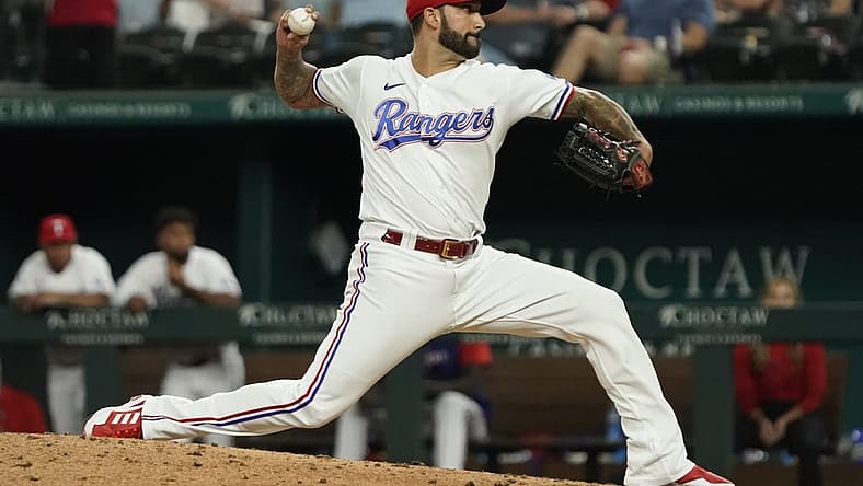 Jun 21, 2022; Arlington, Texas, USA; Texas Rangers relief pitcher Matt Bush (51) throws to the plate during the seventh inning against the Philadelphia Phillies at Globe Life Field. Mandatory Credit: Raymond Carlin III-USA TODAY Sports