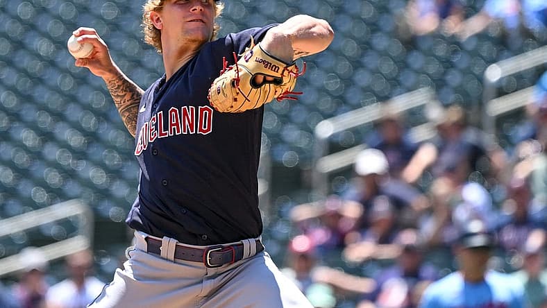 Jun 23, 2022; Minneapolis, Minnesota, USA; Cleveland Guardians starting pitcher Zach Plesac (34) delivers a pitch against the Minnesota Twins during the first inning at Target Field. Mandatory Credit: Nick Wosika-USA TODAY Sports