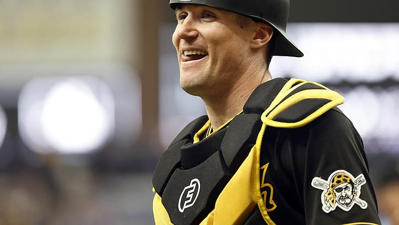 Jun 26, 2022; St. Petersburg, Florida, USA; Pittsburgh Pirates catcher Tyler Heineman (54) smiles as he looks on during the seventh inning against the Tampa Bay Rays at Tropicana Field. Mandatory Credit: Kim Klement-USA TODAY Sports