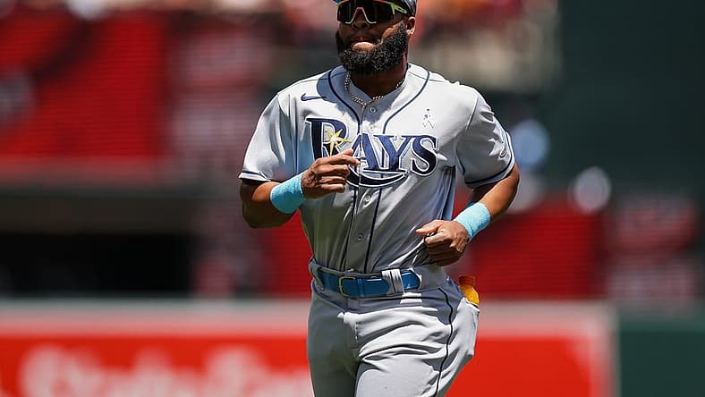 Jun 19, 2022; Baltimore, Maryland, USA; Tampa Bay Rays left fielder Manuel Margot (13) runs on the field before the game against the Baltimore Orioles at Oriole Park at Camden Yards. Mandatory Credit: Scott Taetsch-USA TODAY Sports