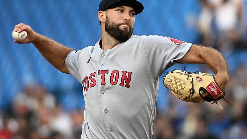Jun 28, 2022; Toronto, Ontario, CAN; Boston Red Sox starting pitcher Michael Wacha (52) delivers a pitch against the Toronto Blue Jays in the first inning at Rogers Centre. Mandatory Credit: Dan Hamilton-USA TODAY Sports