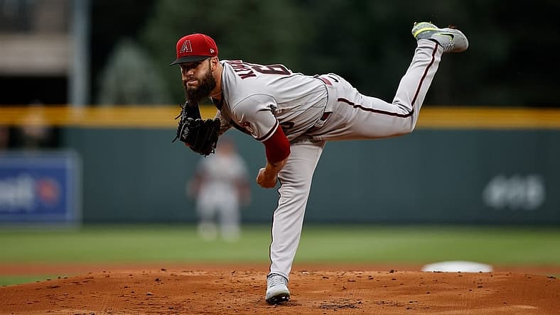 Jul 2, 2022; Denver, Colorado, USA; Arizona Diamondbacks starting pitcher Dallas Keuchel (60) pitches in the first inning against the Colorado Rockies at Coors Field. Mandatory Credit: Isaiah J. Downing-USA TODAY Sports
