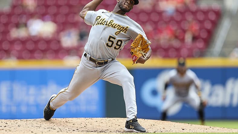 Jul 7, 2022; Cincinnati, Ohio, USA; Pittsburgh Pirates starting pitcher Roansy Contreras (59) pitches against the Cincinnati Reds in the second inning at Great American Ball Park. Mandatory Credit: Katie Stratman-USA TODAY Sports