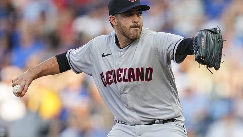 Jul 8, 2022; Kansas City, Missouri, USA; Cleveland Guardians starting pitcher Aaron Civale (43) throws against the Kansas City Royals during the first inning at Kauffman Stadium. Mandatory Credit: Jay Biggerstaff-USA TODAY Sports