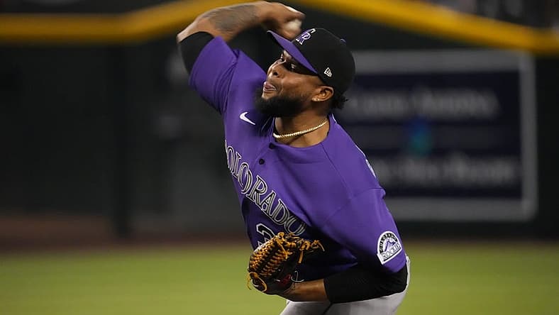 Jul 8, 2022; Phoenix, Arizona, USA; Colorado Rockies relief pitcher Alex Colome (37) throws against the Arizona Diamondbacks during the ninth inning at Chase Field. Mandatory Credit: Joe Camporeale-USA TODAY Sports