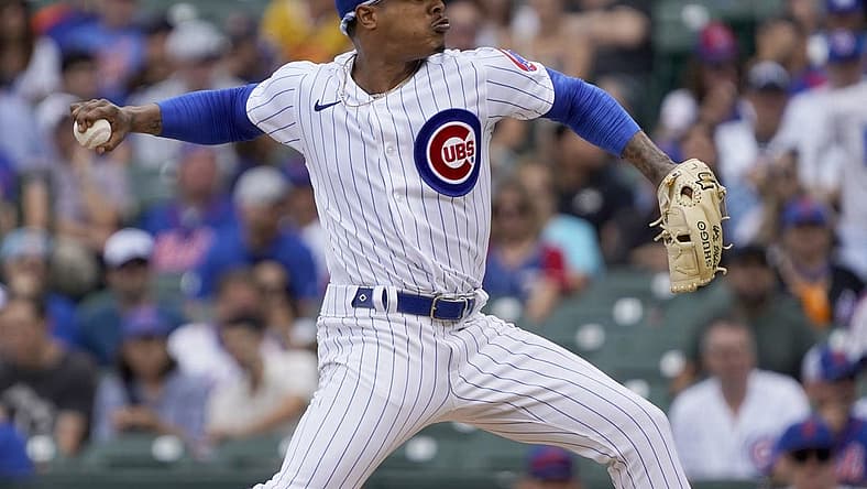 Jul 16, 2022; Chicago, Illinois, USA; Chicago Cubs starting pitcher Marcus Stroman (0) throws against the New York Mets during the first inning in game one of a doubleheader at Wrigley Field. Mandatory Credit: David Banks-USA TODAY Sports